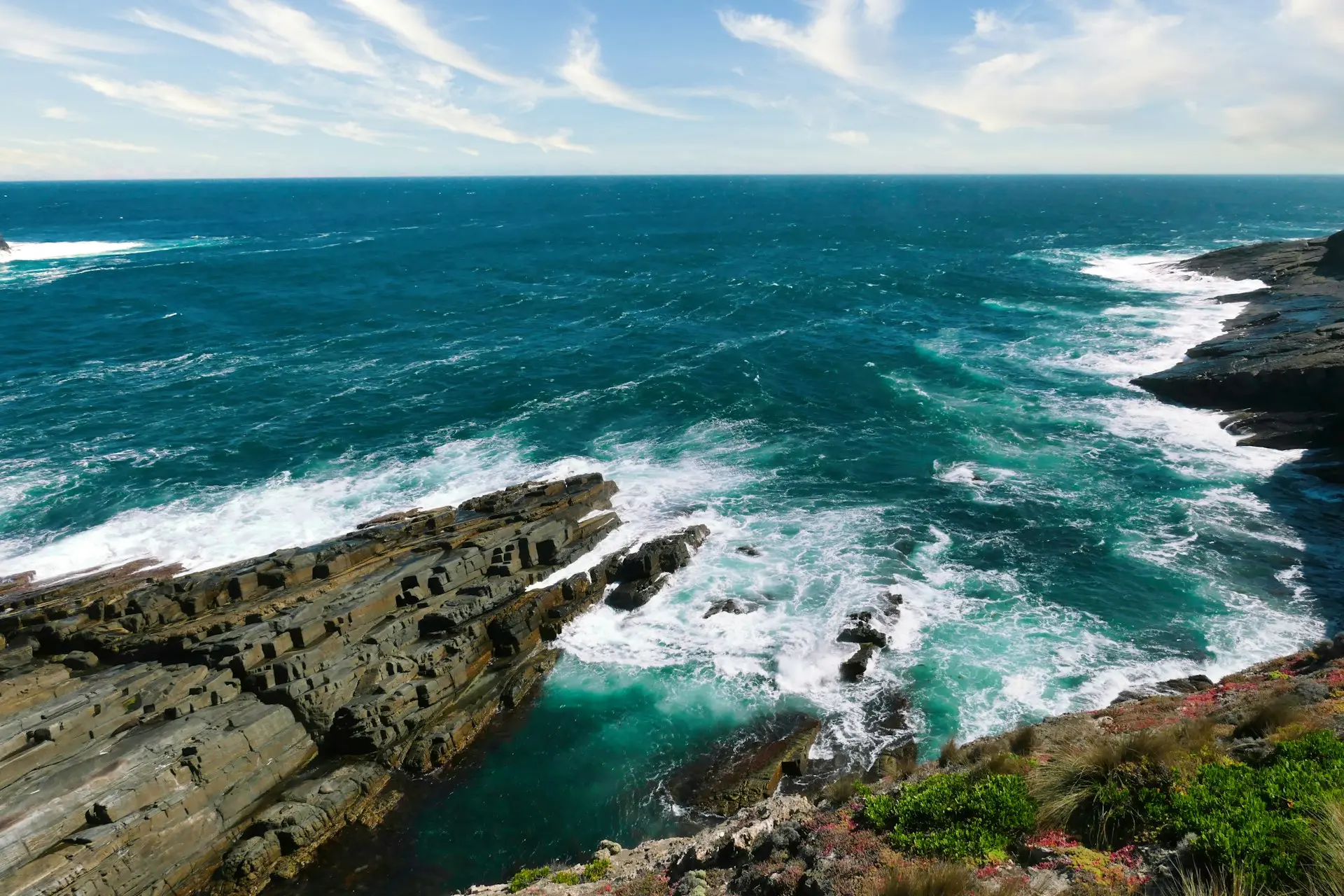 A view of the ocean from a cliff