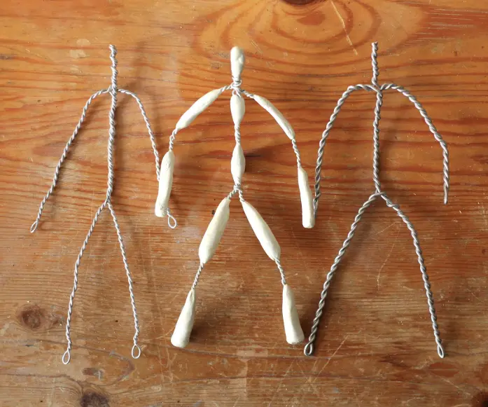 Wire armature framework covered with fabric and stiffener showing the internal skeleton structure of a textile sculpture