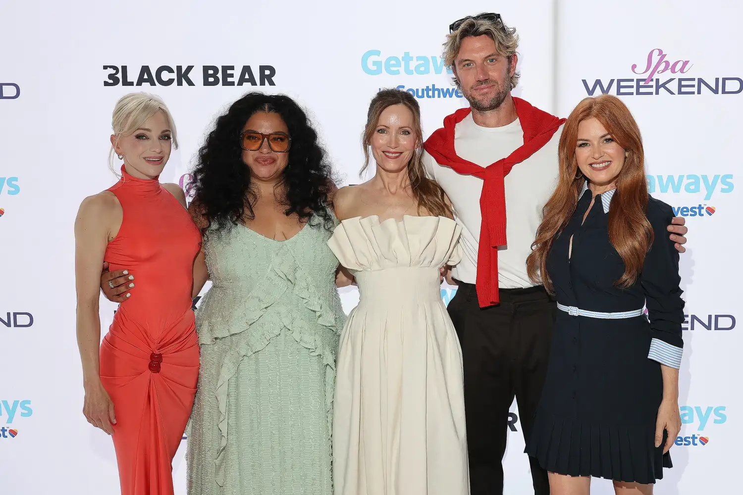 (Left-right:) Anna Faris, Michelle Buteau, Leslie Mann, Adam Demos and Isla Fisher at Black Bear Pictures’ ‘Spa Weekend’ Burbank Southwest Airlines Spa Retreat at Atlantic Aviation Burbank on Aug. 7. Eric Charbonneau/Black Bear Pictures via Getty